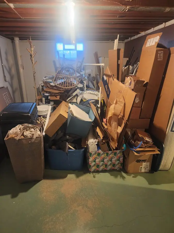 Roll-off dumpster container at job site for 6 Yard Dumpster Rental in Frenchtown